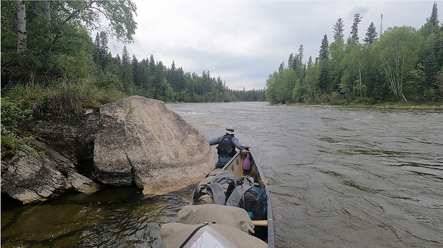 wading with canoe